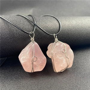 Natural raw rose quartz pendants with silver wire wrap craftsmanship and black necklaces