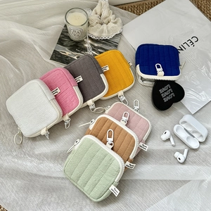 Quilted mini headphone pouch in eight pastel colors with wave texture and hanging hook