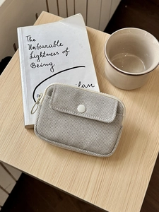 Mini canvas pouch for data cables and coins with button pocket and ring zipper