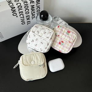 Mini quilted fabric headphone pouch set with floral patterns and keychain hook