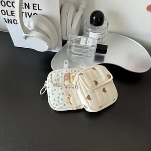 Quilted mini earphone storage pouch with star and heart prints and metal carabiner