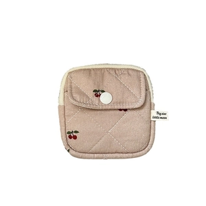 Quilted mini earphone case with cherry pattern and Big Star Little Moon label