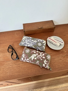 Ethnic style cotton linen storage bags with floral embroidery and wrap-around zippers