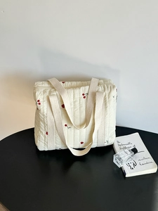 Quilted off-white tote bag with cherry prints for moms, featuring large capacity and soft fabric