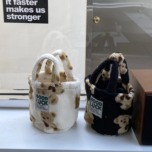 Teddy plush bucket bag with cute bear print and Good Luck tag in white and black