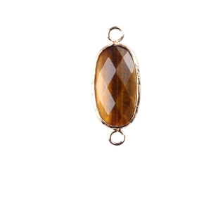 Pendentif œil de tigre facetté avec bord doré et double connecteur pour création de bijoux