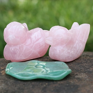 Natural rose quartz mandarin duck figurines on green lotus leaf base for home decor
