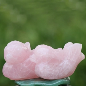 Natural rose quartz mandarin duck figurines on jade base for bedroom decor
