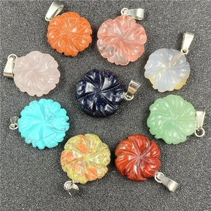 Detailed set of eight assorted flower-carved gemstone pendants with metal bails