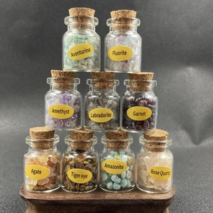 Set of 9 natural crystal gemstone specimens in mini glass bottles with cork stoppers