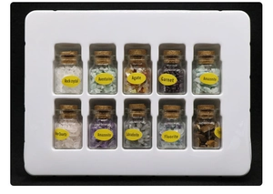 Macro detail of ten crystal mineral specimens in glass jars with cork stoppers and labels