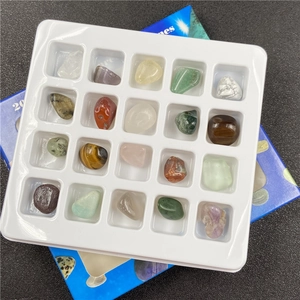 Detailed top view of 20 polished mineral specimens and crystals in a white grid display tray