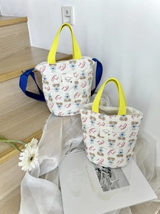 Sac seau matelassé en coton avec imprimé chien et bandoulière bleue vive