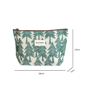 Detailed size view of linen makeup bag with pine tree patterns measuring 25x16x7cm