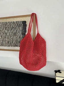 Handmade red hollow crochet cotton rope tote bag with bohemian vacation style for women