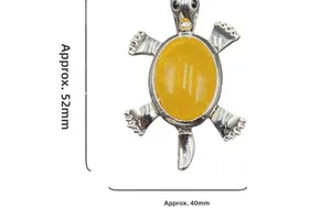 Detailed size view of turtle brooch with oval yellow gemstone, 52mm by 40mm measurements