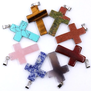 Set of 8 colorful natural crystal cross pendants with stainless steel bails on white