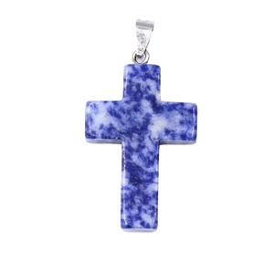 Natural blue sodalite crystal cross pendant with silver bail on white background