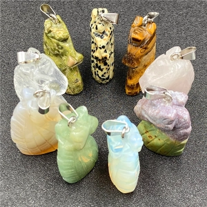 Tiger eye stone and mixed crystal unicorn pendants set with metal loops for necklaces