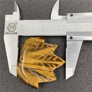 Tiger eye stone maple leaf carved pendant measured with caliper, about 4.5cm width