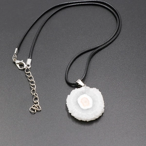 Natural solar flower agate slice pendant necklace on black cord with mineral crystal