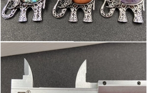 Vue détaillée de pendentifs éléphant avec améthyste, pierre de soleil et nacre d'abalone