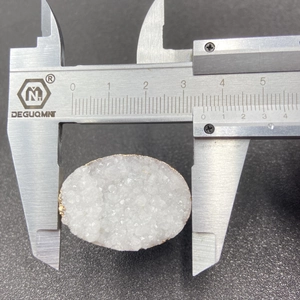 White druzy crystal geode pendant with gold plating showing 35mm measurement