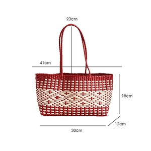 Detailed size chart of the woven tote bag showing 41cm top width and 23cm handle drop