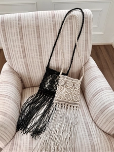 Handmade bohemian macrame shoulder bags with long fringe in black and cream beige colors