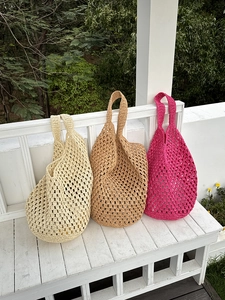 Three hollow crochet knit tote bags in white, khaki, and rose red for summer beach vacations