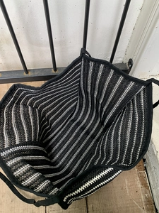 Large black and white striped woven tote bag with durable reinforced top edges