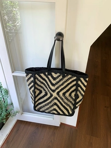 Handwoven striped tote bag with large capacity and black leather shoulder straps
