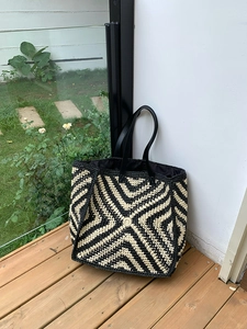 Handwoven oversized tote bag with black and beige geometric pattern for summer holidays