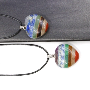 Rainbow chakra crystal heart pendant necklace with black cord and silver clasp