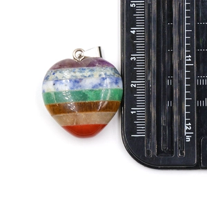 Detailed measurement of a heart-shaped multi-color chakra stone pendant showing 1.5-inch size