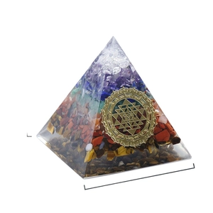Handcrafted Orgone pyramid with seven chakra natural stones and Sri Yantra symbol