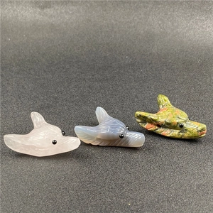 Carved natural stone wolf head pendants in rose quartz, grey agate and green jasper