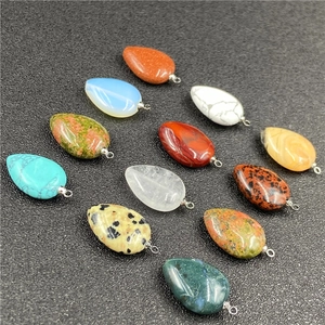 Detailed set of 12 multi-color teardrop crystal pendants with silver metal clasps