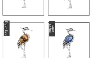 Detailed comparison of bird brooches featuring tiger's eye stone and lapis lazuli gemstones