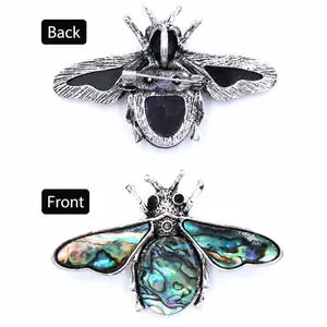 Amethyst and abalone shell bee pendant brooch with a dual-use vintage silver design