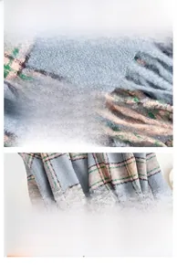 Detail of light blue plaid scarf with orange accents and soft tassel fringe texture