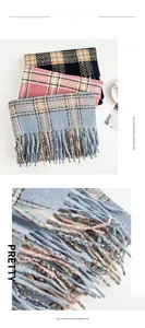 Detailed view of lilac plaid imitation cashmere scarf with long tassel fringe edges