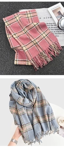 Detail of checkered scarves with fringe tassels in pink-yellow and grey-blue color options