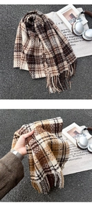 Close-up of retro plaid scarf with tassels, showing thick cashmere-like texture and brown tones
