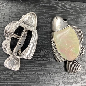 Fish pendant brooch with colorful abalone shell inlay and antique silver finish