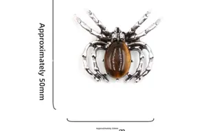 Vue détaillée de la broche araignée avec pierre œil de tigre, taille environ 50mm
