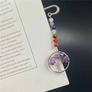 Close-up of seven chakra stones and amethyst Tree of Life wire-wrapped pendant bookmark.