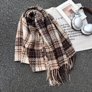 Classic vintage plaid scarf with tassels in brown and beige colors for autumn winter