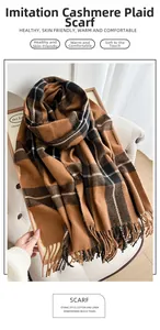 Detailed close-up of soft cashmere-feel brown plaid scarf with classic fringe tassels
