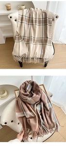Detailed close-up of thick checkered tassels scarves with soft cashmere-like texture